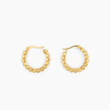 gold hoop earrings with faceted bead tex