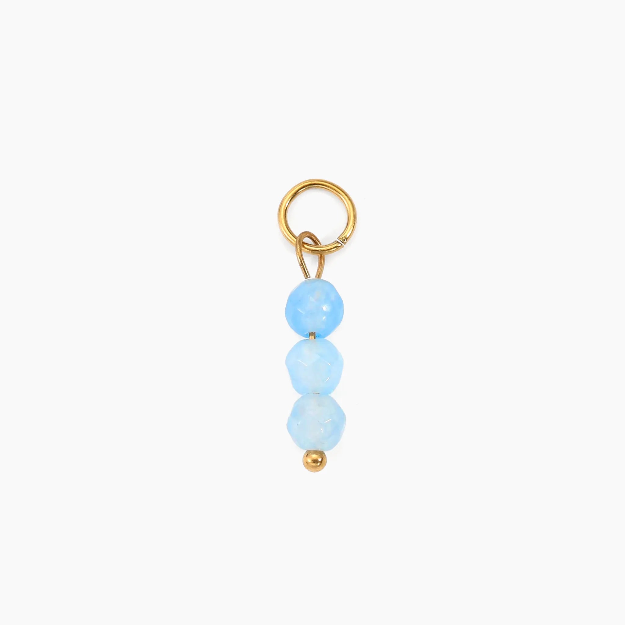 Blue bead charm on a white background