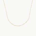 gold choker with tiny spaced beads on fine chain