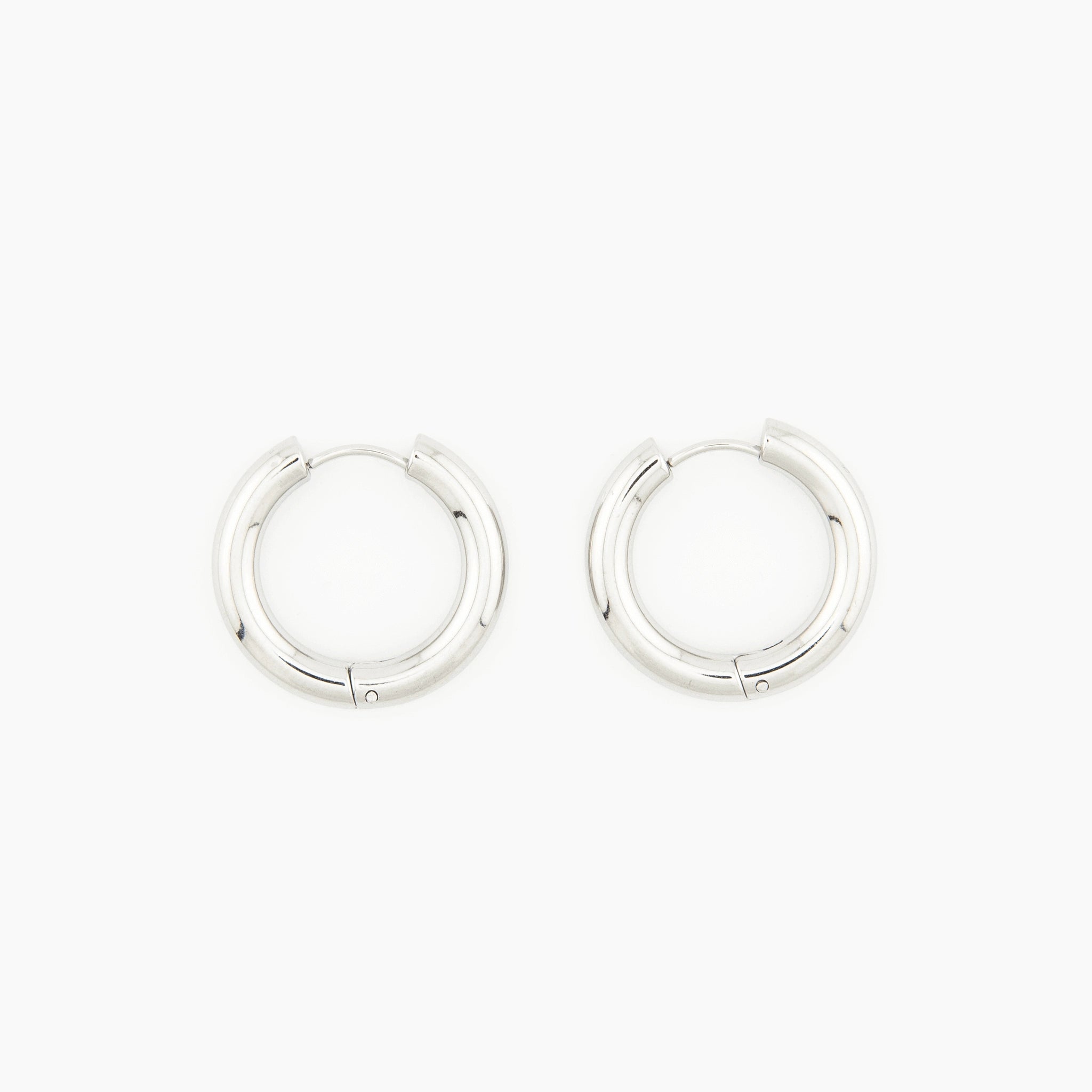pair of polished silver hoop earrings with a minimal 4 mm design