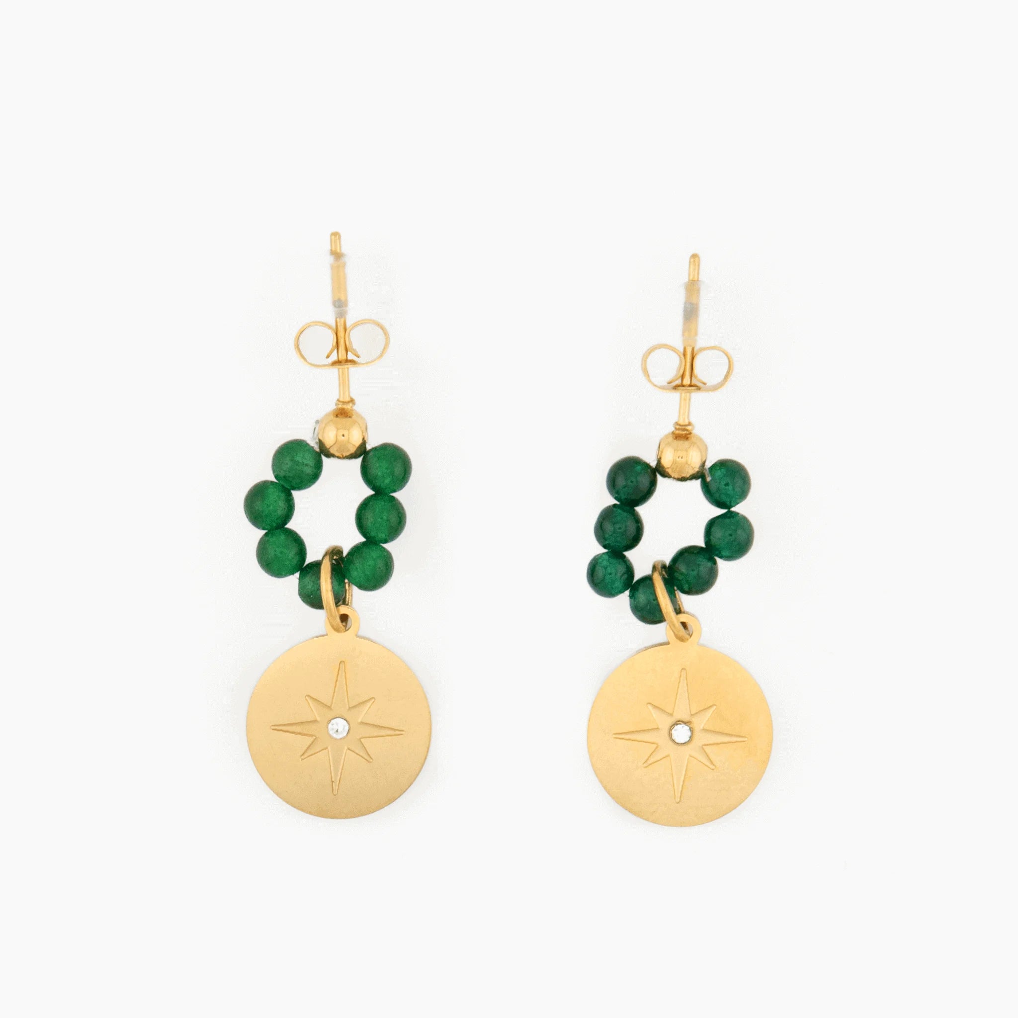 gold earrings with green beads and engraved compass charm with crystal center