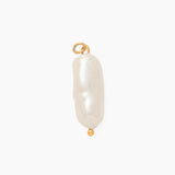 Long pearl pendant on a white background