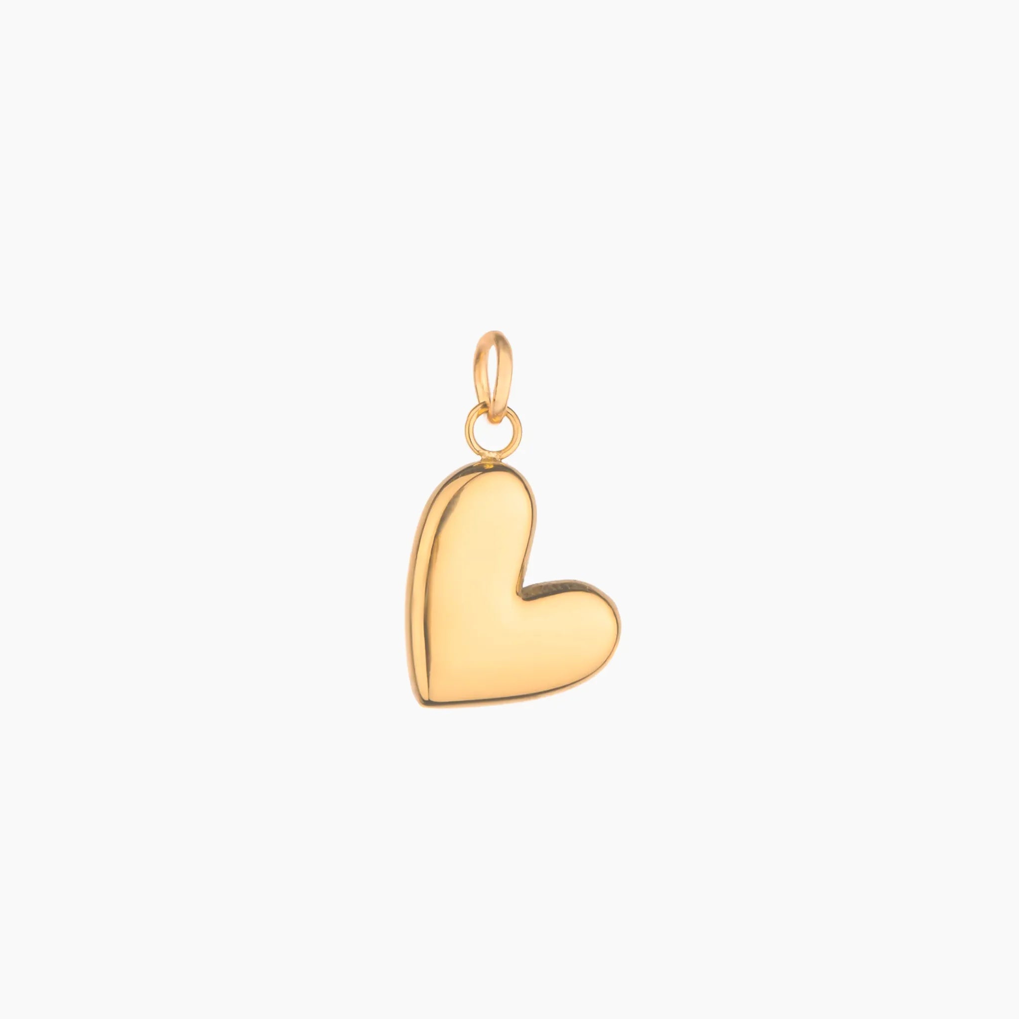 Gold heart-shaped pendant on a white background