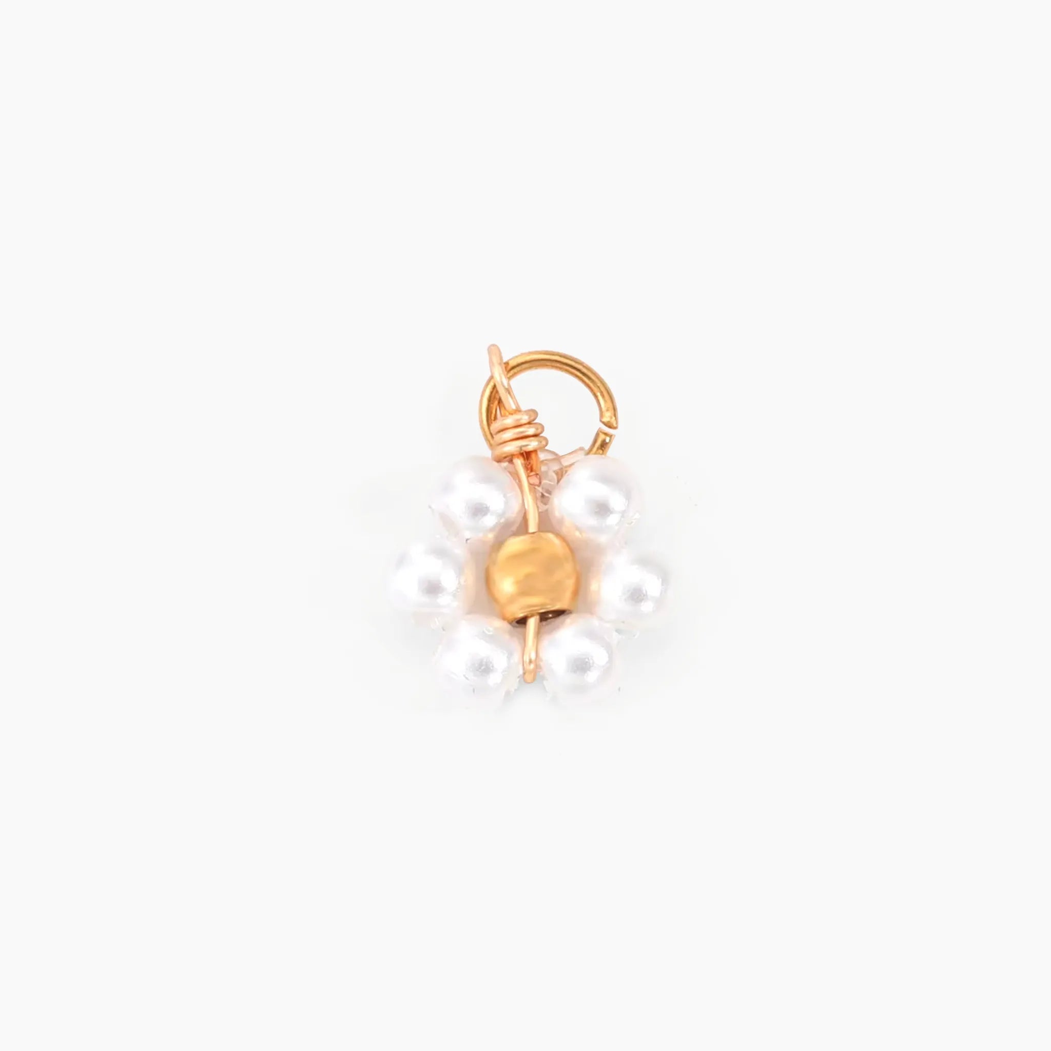 Pearl flower charm on a white background