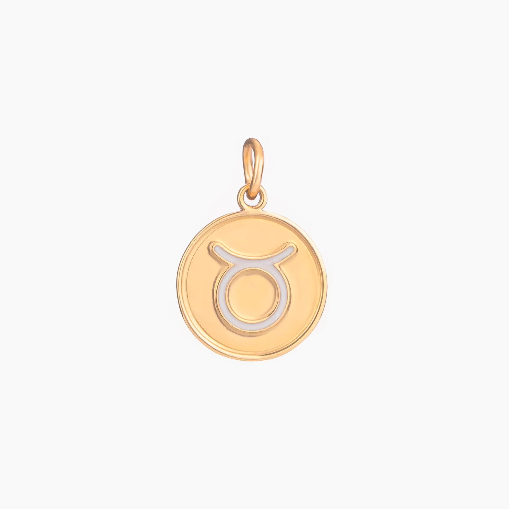 Golden pendant with taurus zodiac symbol on a white background